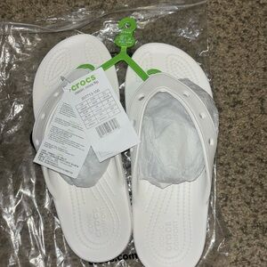 Brand new with tags croc flip flops